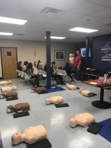 photo of corporate CPR training being demonstrated