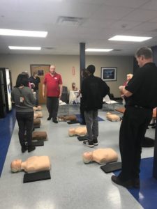 photo of corporate CPR training being demonstrated